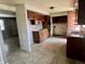 Classic kitchen with plenty of counter space, tile backsplash, and ample cabinet storage at 10131 Nassau Ln, Indianapolis, IN 46229