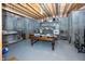 Unfinished basement provides ample storage space and potential for customization, and exposed ceiling at 10415 Charter Oaks, Carmel, IN 46032