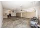 Spacious garage with two doors, concrete flooring, and white walls at 10415 Charter Oaks, Carmel, IN 46032