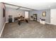 Spacious home office features a modern design, ample storage, and plenty of room to work at 10415 Charter Oaks, Carmel, IN 46032