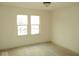 Empty bedroom filled with natural light, offering a blank canvas for personalized design at 1056 N Mount St, Indianapolis, IN 46222
