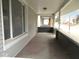 Spacious covered front porch, perfect for relaxing and enjoying the neighborhood views at 1056 N Mount St, Indianapolis, IN 46222