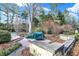 A beautiful backyard with garden and patio area and a mature landscape at 10614 Winterwood, Carmel, IN 46032