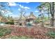 A beautiful backyard with garden and mature landscape in the fall at 10614 Winterwood, Carmel, IN 46032
