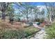 A beautiful backyard with garden and hardscaped area and a mature landscape at 10614 Winterwood, Carmel, IN 46032