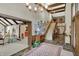 Grand foyer features staircase, high ceilings, beautiful decor, and seamless access to other living spaces at 10614 Winterwood, Carmel, IN 46032