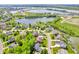 Overhead shot showcases the neighborhood's mature landscaping, waterways, and attractive homes at 10792 Harbor Bay Dr, Fishers, IN 46040