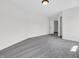 Large bedroom with neutral walls, plush carpet, and modern recessed lighting at 10792 Harbor Bay Dr, Fishers, IN 46040