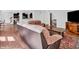 A comfortable living room is showcased, featuring hardwood floors and stylish furniture at 10792 Harbor Bay Dr, Fishers, IN 46040