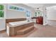 The main bathroom is bright, with a soaking tub, natural light, and a view of the bedroom at 10792 Harbor Bay Dr, Fishers, IN 46040