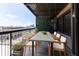 Lovely outdoor dining area is situated on a balcony and features seating for eight at 110 E Washington St # 802, Indianapolis, IN 46204