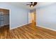 Bedroom featuring walk-in closet with wood flooring at 110 E Washington St # 802, Indianapolis, IN 46204