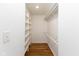 Organized walk-in closet with ample shelving and storage space at 110 E Washington St # 802, Indianapolis, IN 46204