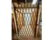 Industrial elevator showcasing secure gate for transport with wood paneling at 110 E Washington St # 802, Indianapolis, IN 46204