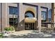 Beautiful exterior view of the building with large windows and outdoor seating area at 110 E Washington St # 802, Indianapolis, IN 46204