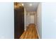 Hallway features wood flooring and closet space at 110 E Washington St # 802, Indianapolis, IN 46204