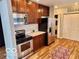 Features updated stainless appliances, granite counters, and wood cabinets at 110 E Washington St # 802, Indianapolis, IN 46204