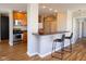 Modern kitchen features stainless steel appliances, a breakfast bar, and an open concept layout at 110 E Washington St # 802, Indianapolis, IN 46204