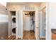 Utility room with shelving and washer/dryer at 110 E Washington St # 802, Indianapolis, IN 46204