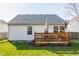 Exterior view of a wooden deck with decorative features attached to the home at 11930 Titania Cir, Indianapolis, IN 46236