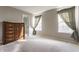 Spacious bedroom with carpet, natural light, and neutral walls for a peaceful ambiance at 11930 Titania Cir, Indianapolis, IN 46236