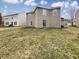 Spacious backyard offering ample space for outdoor activities and gardening at 12416 Teacup Way, Indianapolis, IN 46235
