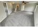 Large bonus room featuring neutral carpet and fresh, neutral paint at 12416 Teacup Way, Indianapolis, IN 46235