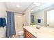 Bathroom with shower, tub, single vanity, and plant at 13082 Overview Dr # 5A, Fishers, IN 46037