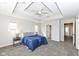 Bedroom with large windows, neutral walls, and a ceiling fan at 13082 Overview Dr # 5A, Fishers, IN 46037