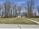 Exterior view of an art installation in a wide green space with many trees at 13082 Overview Dr # 5A, Fishers, IN 46037