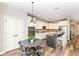 Spacious kitchen with white cabinets, stainless steel appliances, and eat-in breakfast nook at 13082 Overview Dr # 5A, Fishers, IN 46037