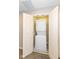 A stacked washer and dryer in a closet at 13082 Overview Dr # 5A, Fishers, IN 46037