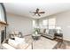 Comfortable living room with fireplace, plush seating, and bright natural light at 13082 Overview Dr # 5A, Fishers, IN 46037