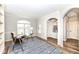 Bright office featuring large arched window and built-in shelving at 13082 Overview Dr # 5A, Fishers, IN 46037