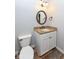 Stylish powder room with granite countertop vanity and modern fixtures at 13082 Overview Dr # 5A, Fishers, IN 46037