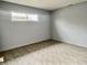 Bedroom with neutral walls, linoleum floors and a single window at 151 N 8Th Ave, Beech Grove, IN 46107