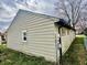 Exterior view of home showing the side, siding, and landscaping at 151 N 8Th Ave, Beech Grove, IN 46107