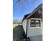 Exterior view of home showing siding and yard at 151 N 8Th Ave, Beech Grove, IN 46107