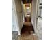 Hallway with decorative tile floor that leads to another area of the house at 151 N 8Th Ave, Beech Grove, IN 46107