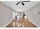 Open-concept living space with gleaming hardwood floors and abundant natural light at 1540 N Chester Ave, Indianapolis, IN 46201