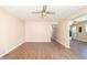 Open living room featuring laminate flooring, neutral colored walls, and an open floorplan at 1701 Nelson Ave, Indianapolis, IN 46203