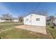Backyard featuring a concrete patio and a well-maintained lawn at 1701 Nelson Ave, Indianapolis, IN 46203