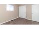 Empty bedroom featuring hardwood floors and a closet at 1701 Nelson Ave, Indianapolis, IN 46203
