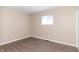 Tan bedroom with hardwood floors and plenty of natural light at 1701 Nelson Ave, Indianapolis, IN 46203