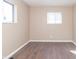 Bright, empty bedroom with hardwood floors at 1701 Nelson Ave, Indianapolis, IN 46203