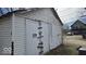 Old shed with double doors on a property needing some TLC at 18 N Sherman Dr, Indianapolis, IN 46201