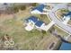 Aerial view of a beautiful home with a concrete patio and a spacious, green backyard at 19041 Karyn Ln, Westfield, IN 46062