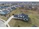 Aerial view of a home with a large yard and mature trees in a residential area at 19041 Karyn Ln, Westfield, IN 46062