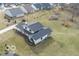 Aerial view of a house with a spacious yard, showing the roof and surrounding landscape at 19041 Karyn Ln, Westfield, IN 46062