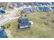 Expansive aerial view showcasing a two-story home on a landscaped lot in a suburban neighborhood at 19041 Karyn Ln, Westfield, IN 46062